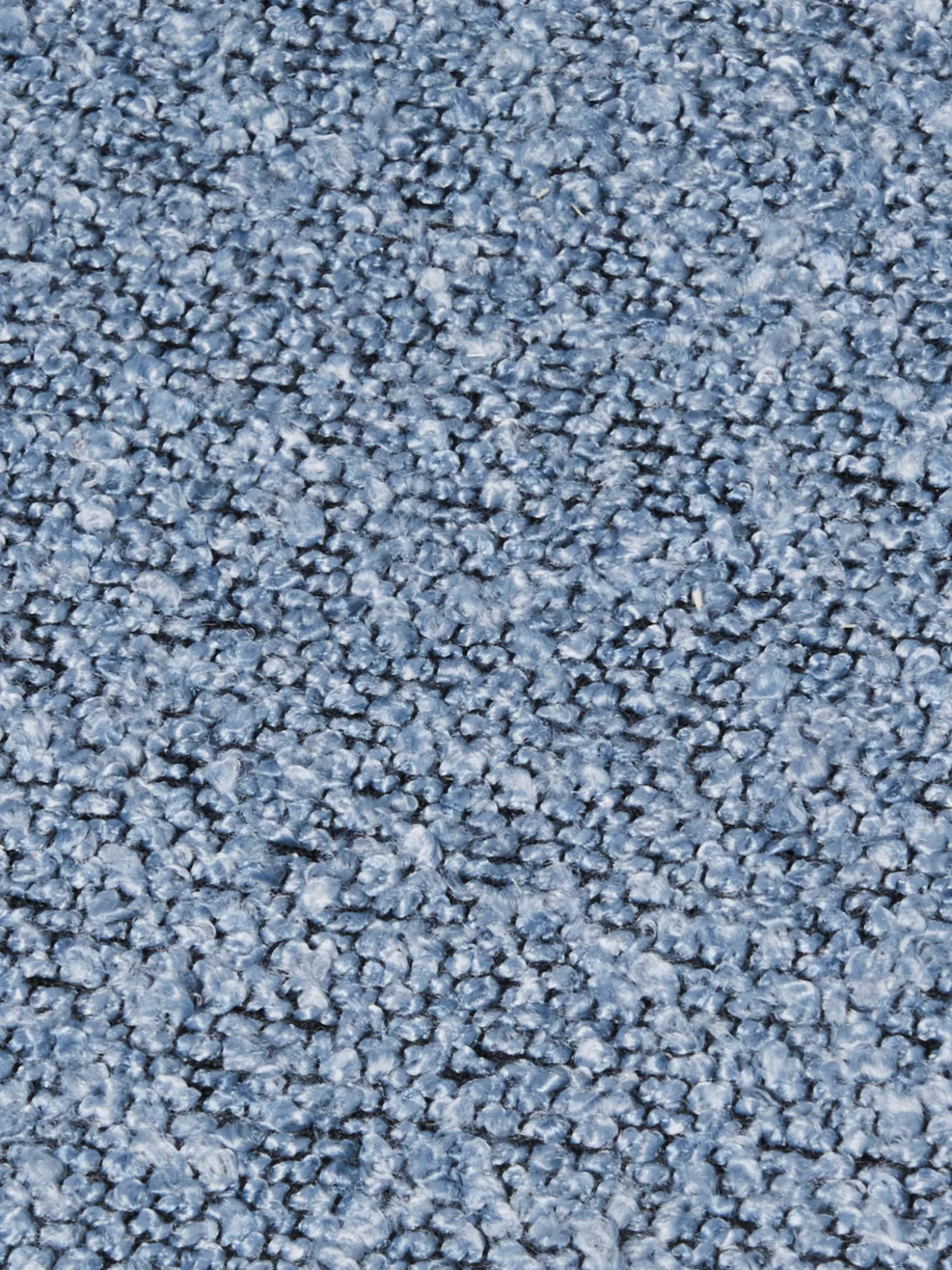 Chaise en tissu bouclé