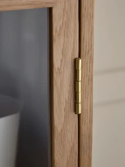 Armoire en bois avec portes en verre