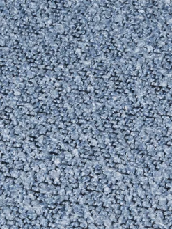 Chaise en tissu bouclé