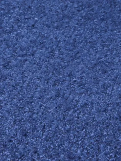 Fauteuil en tissu bouclé