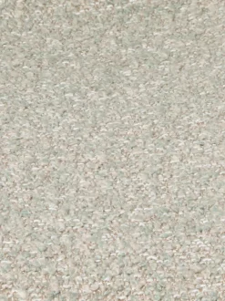 Fauteuil en tissu bouclé