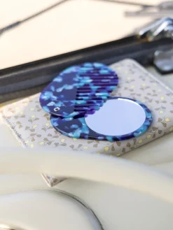 Peigne pliable avec miroir